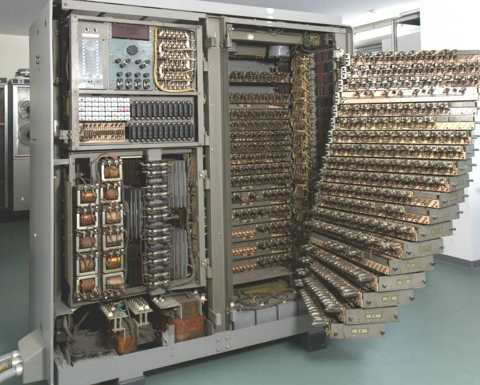 Interior view, showing power supplies on the left, and electronic circuit drawers on the right